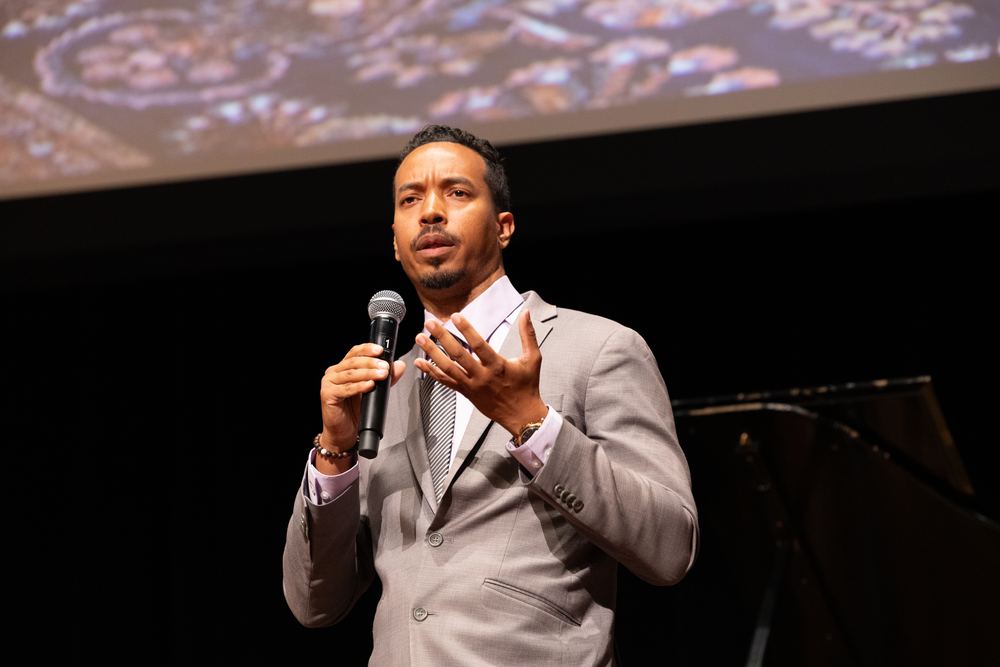 John Wood Jr., speaking on stage